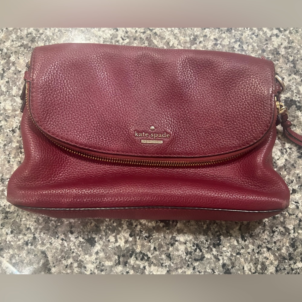 Kate Spade red leather bag.